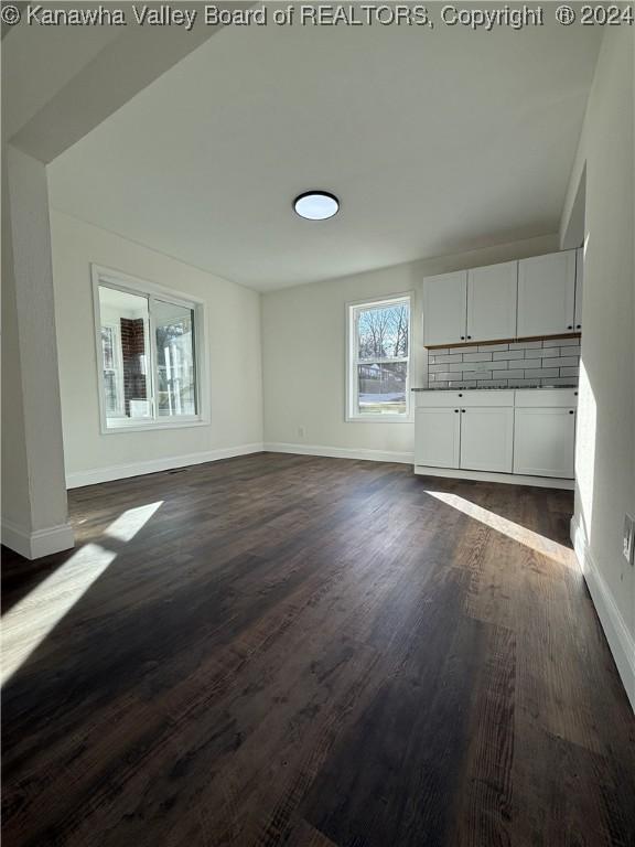 interior space featuring dark wood-type flooring