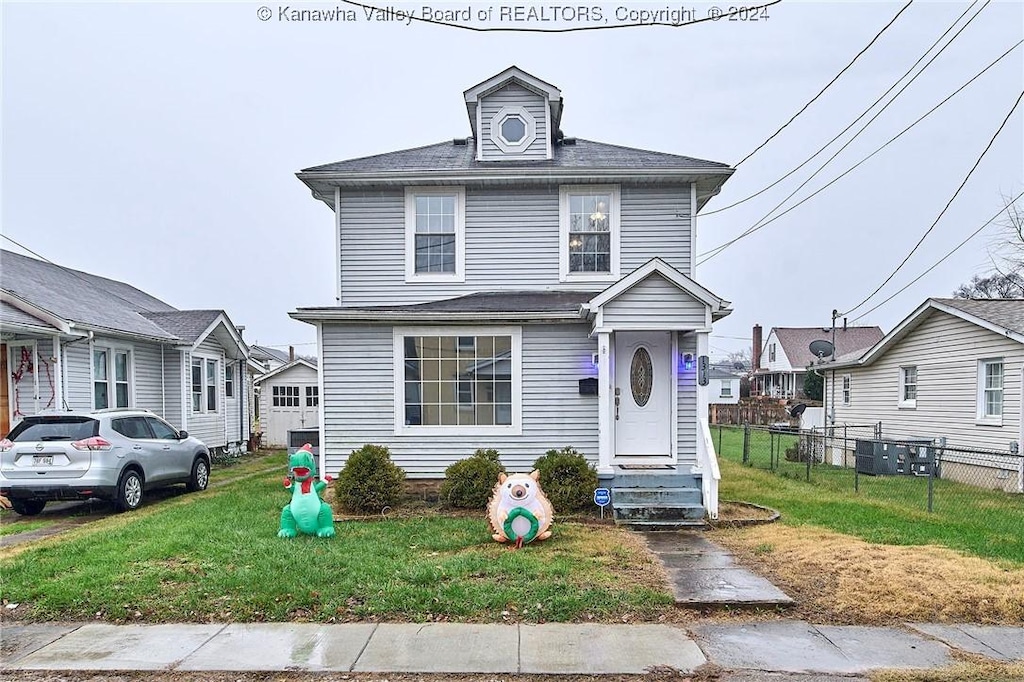 front of property with a front yard