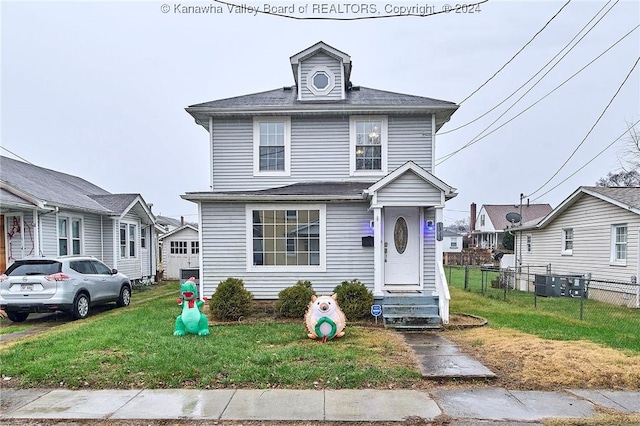 front of property with a front yard