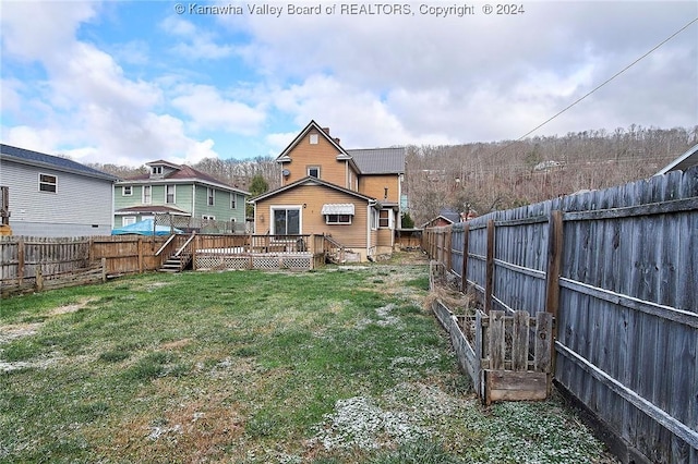 view of yard featuring a deck