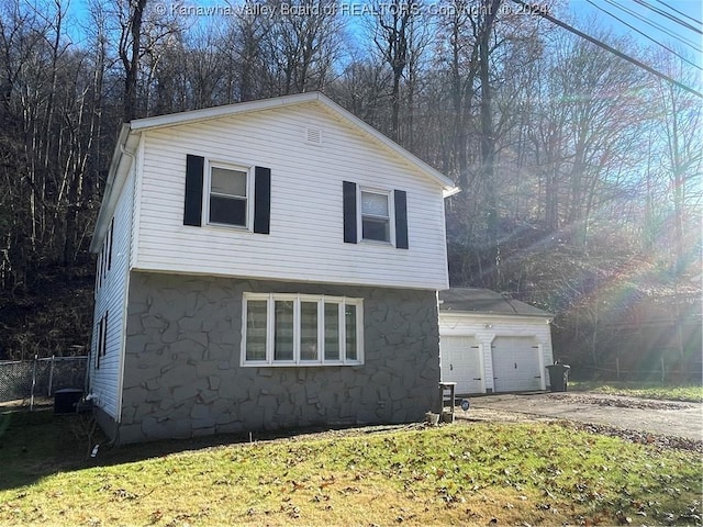 view of home's exterior with a garage