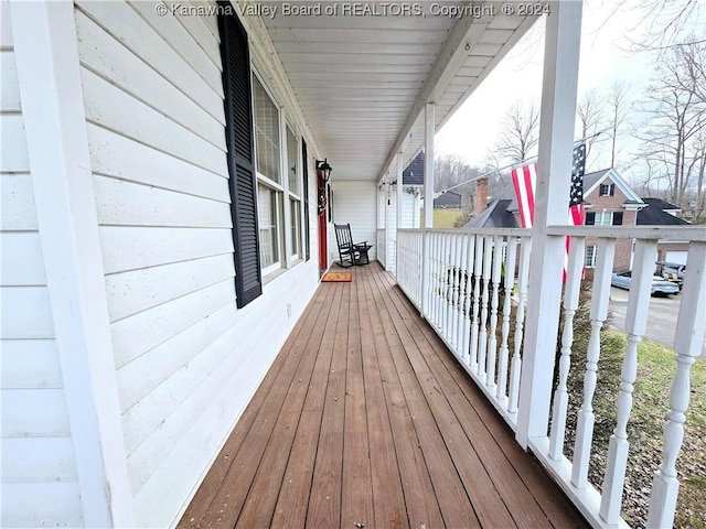 wooden terrace with covered porch