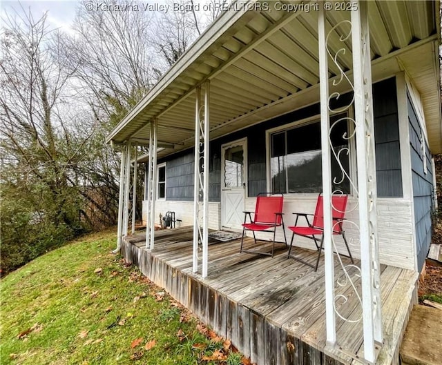 wooden terrace with covered porch