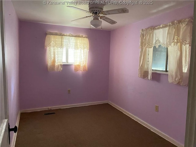 spare room featuring ceiling fan