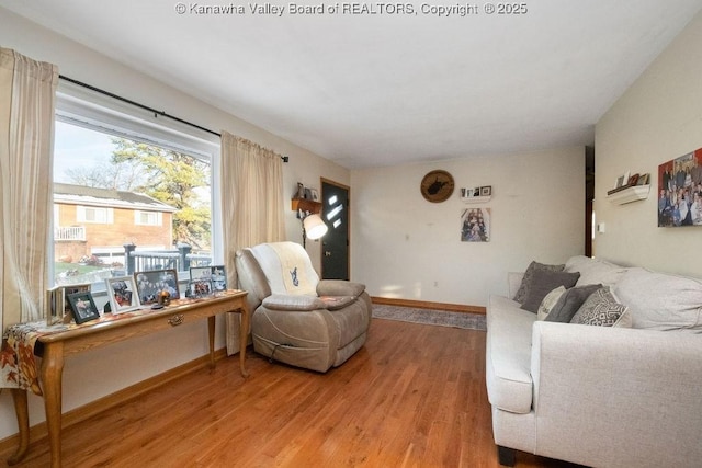 living room with light hardwood / wood-style floors