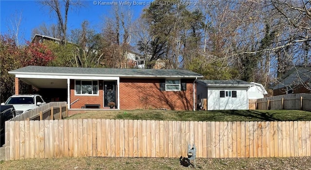 view of front of home with a carport