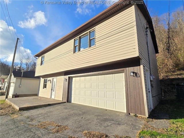 exterior space featuring a garage