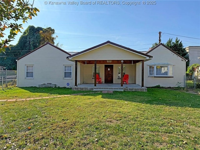 view of front of house featuring covered porch and a front lawn