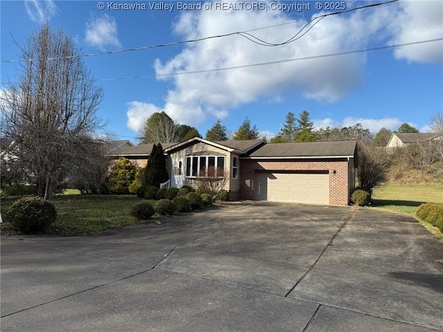 single story home with a front yard and a garage