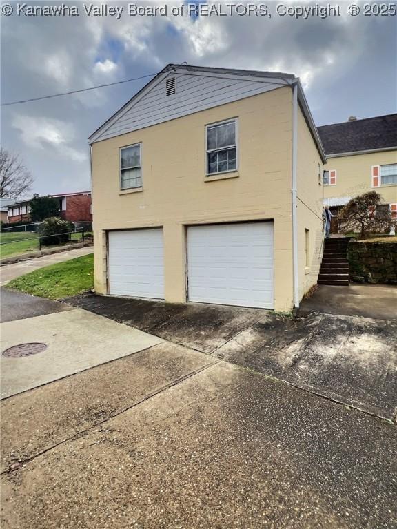 view of home's exterior featuring a garage