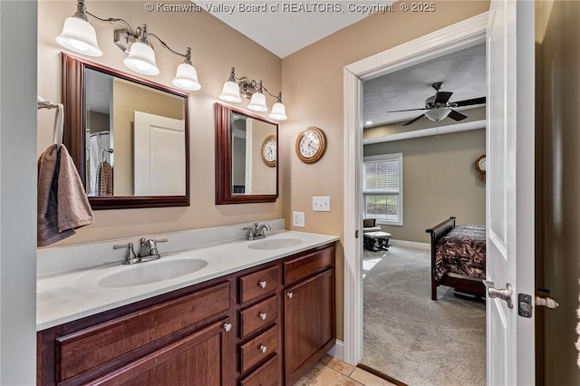 bathroom featuring ceiling fan and vanity