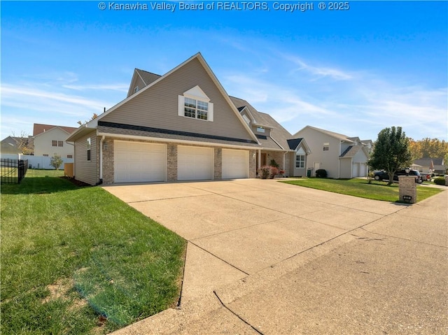 front of property featuring a garage and a front lawn