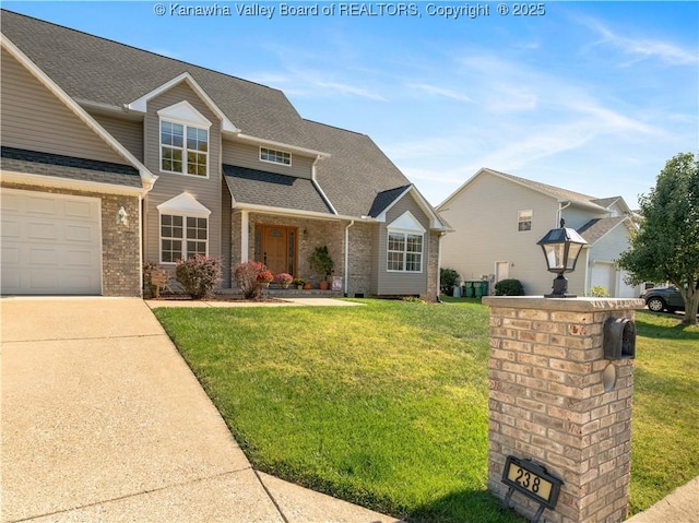 view of front of house with a front lawn and a garage