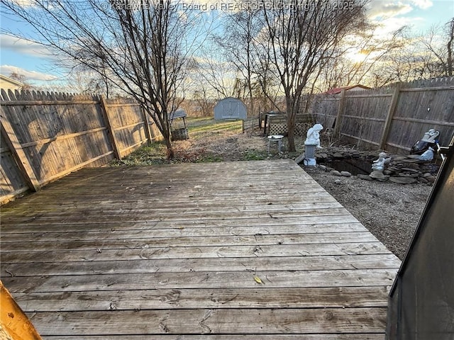 deck featuring a storage shed