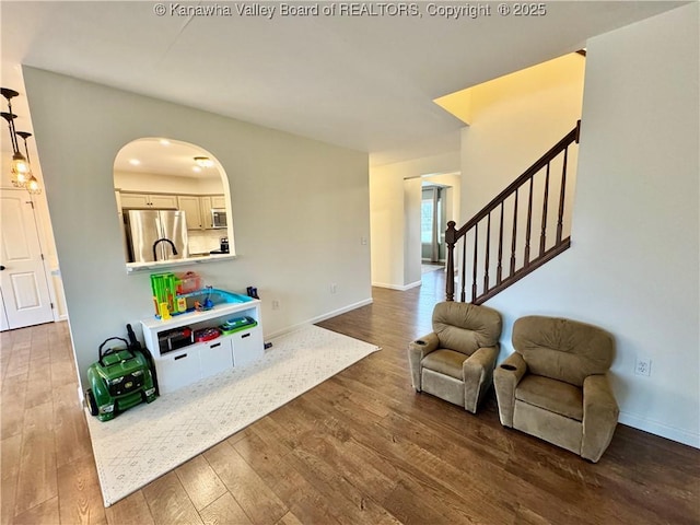 living room with dark wood-type flooring