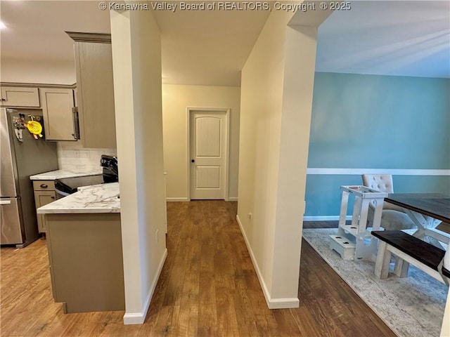 corridor with dark wood-type flooring