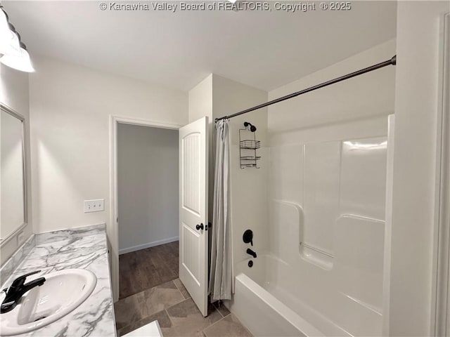 bathroom with vanity and shower / bathtub combination with curtain