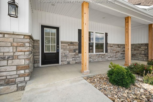 entrance to property with a porch