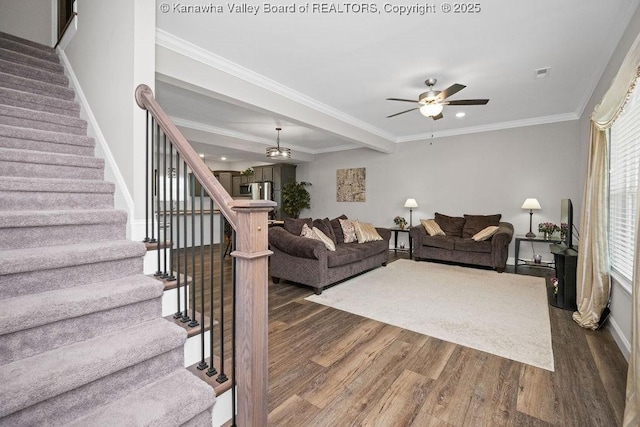 living room with ceiling fan, ornamental molding, and dark wood-type flooring