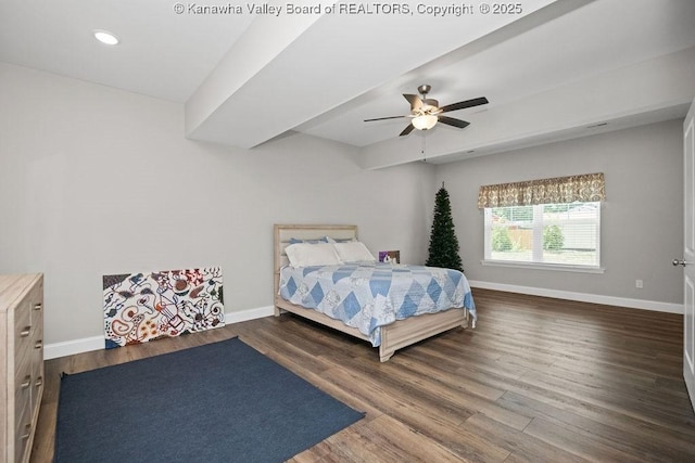 bedroom with dark hardwood / wood-style floors and ceiling fan