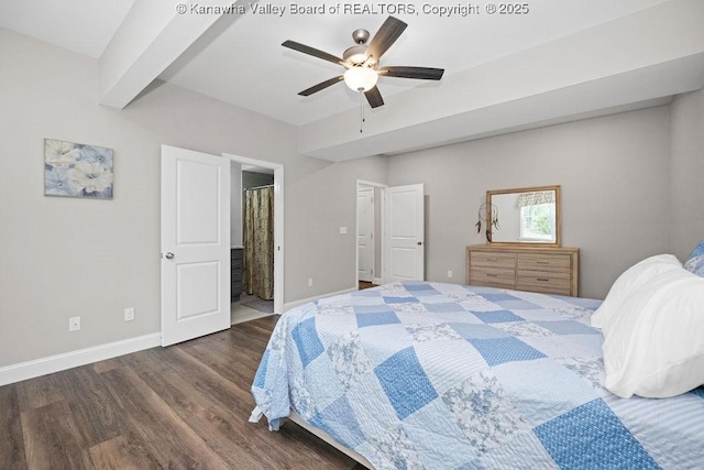 bedroom featuring ceiling fan, dark hardwood / wood-style floors, and ensuite bathroom