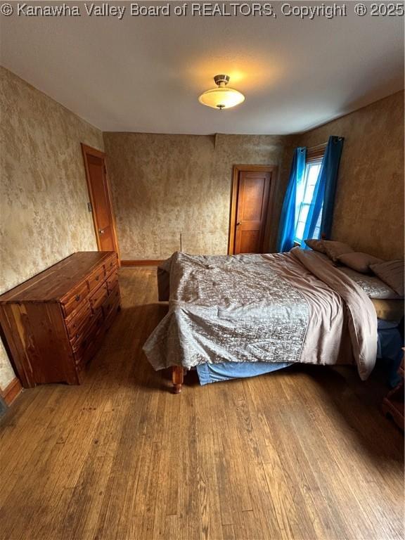 bedroom featuring hardwood / wood-style floors