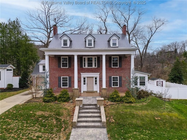 view of front of property with a front lawn