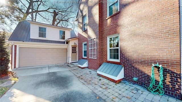 exterior space with a garage