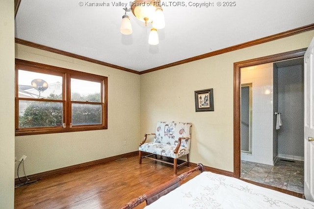 bedroom featuring crown molding, hardwood / wood-style floors, and a chandelier