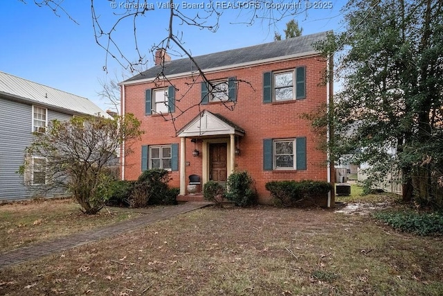 colonial inspired home with cooling unit