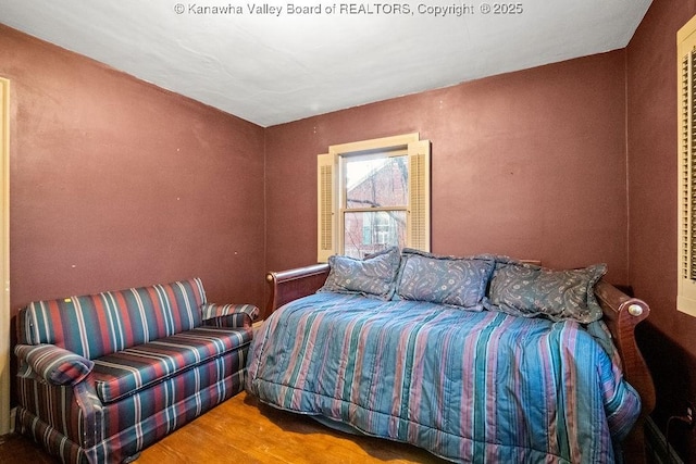 bedroom featuring hardwood / wood-style flooring