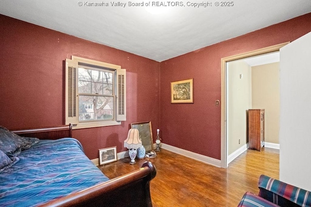 bedroom featuring hardwood / wood-style flooring