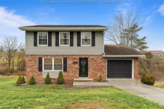 view of front facade with a garage and a front yard