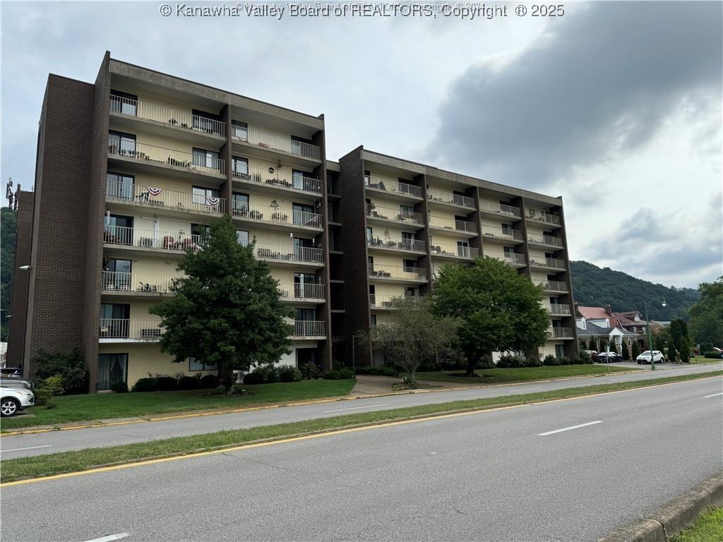 view of building exterior with a mountain view