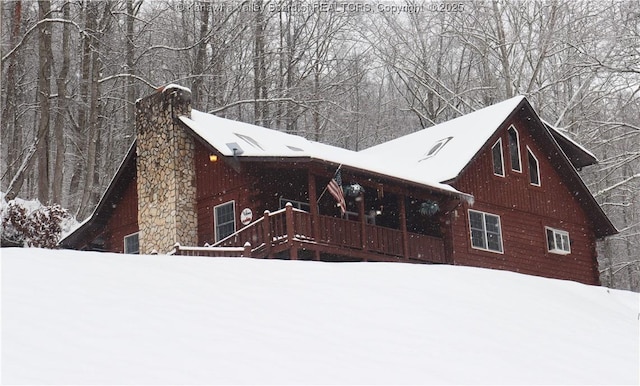 view of snow covered property