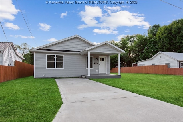 view of front of home with a front lawn and a porch