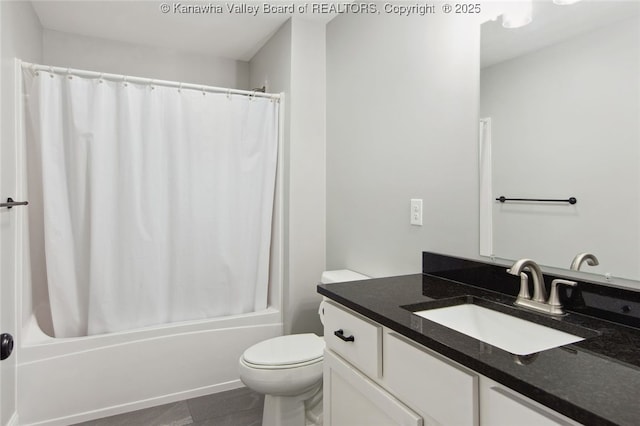 full bathroom featuring tile patterned floors, vanity, toilet, and shower / bath combo with shower curtain