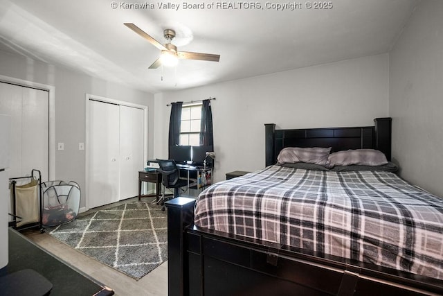 bedroom with hardwood / wood-style floors and ceiling fan