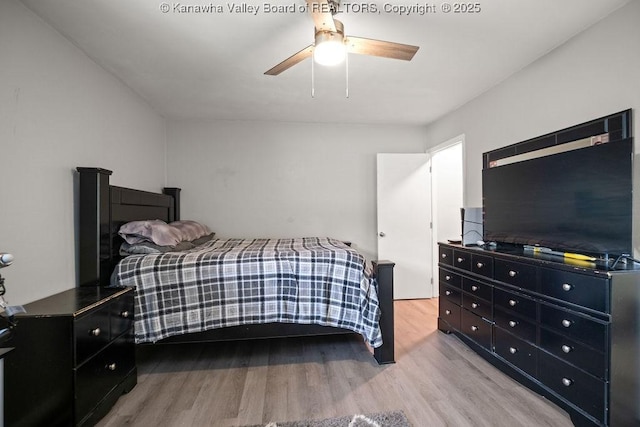 bedroom featuring ceiling fan and light hardwood / wood-style floors