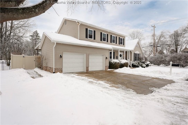 view of front of home with a garage