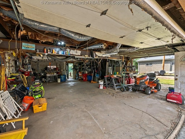 garage featuring a workshop area