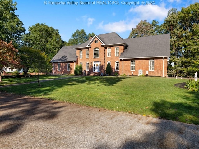 colonial house with a front lawn