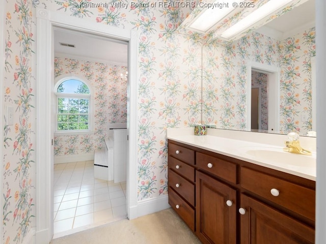 bathroom featuring tile patterned floors and vanity