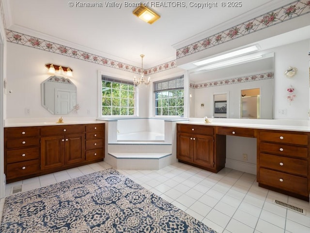 bathroom featuring tile patterned floors, vanity, ornamental molding, and shower with separate bathtub