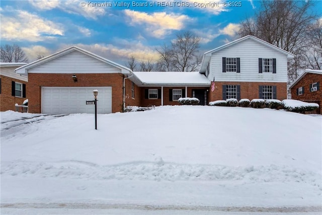 view of front of home with a garage