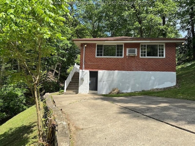 407 S St, South Charleston, WV 25303 - view of front of property featuring brick siding and stairway