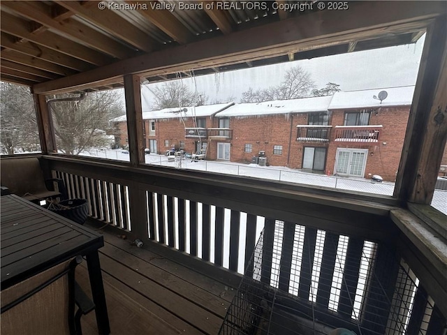 view of snow covered deck