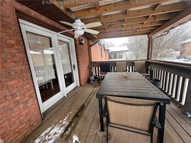 snow covered deck with ceiling fan