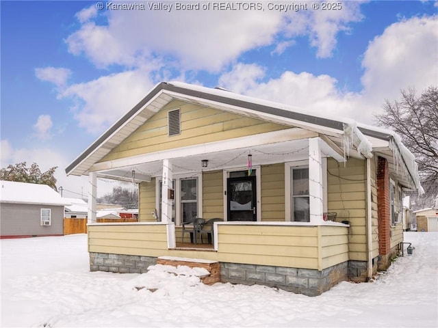 bungalow-style home with a porch