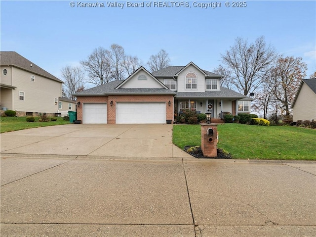 view of front of house featuring a front lawn and a garage